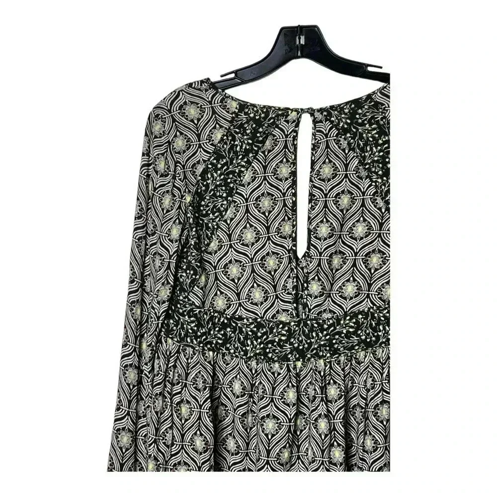 1514. FREE‎ PEOPLE ROLLING HILLS FLARED SLEEVE TOP SIZE XSMALL FLORAL PATTERN